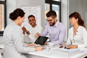 Employees in Office Meeting