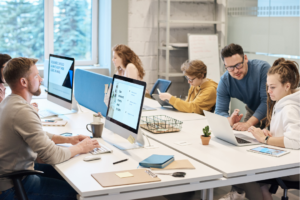 Employees working in computers from the office