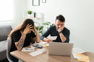 couple stressed with money